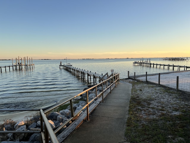 dock area with a water view