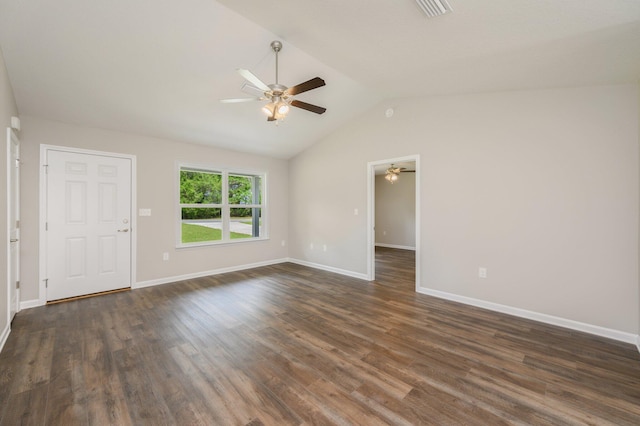 unfurnished room with vaulted ceiling, dark hardwood / wood-style floors, and ceiling fan