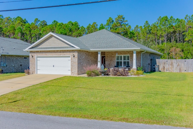 ranch-style house featuring a front lawn and a garage