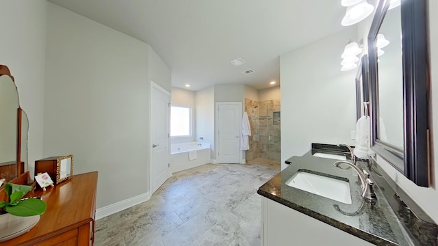 bathroom featuring independent shower and bath and vanity