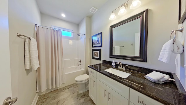 full bathroom featuring toilet, vanity, and shower / bath combo