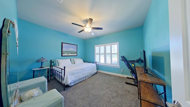 bedroom featuring ceiling fan and carpet flooring