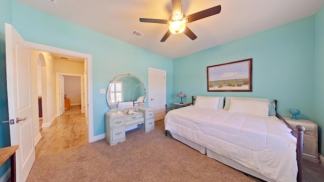 carpeted bedroom featuring ceiling fan