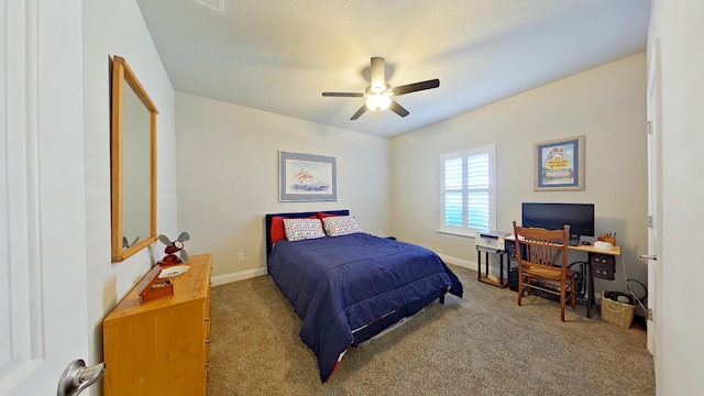 bedroom with ceiling fan and carpet flooring