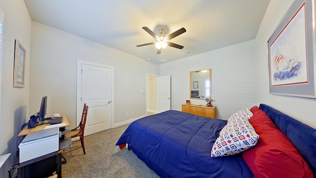 bedroom featuring ceiling fan and light carpet