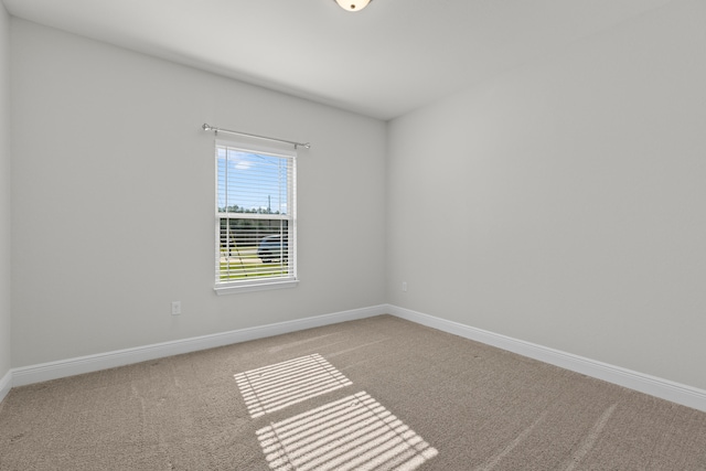 empty room featuring carpet floors