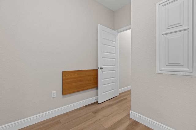 spare room featuring light hardwood / wood-style floors