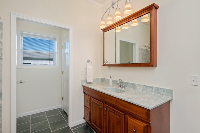 bathroom with vanity, tile patterned floors, and ornamental molding