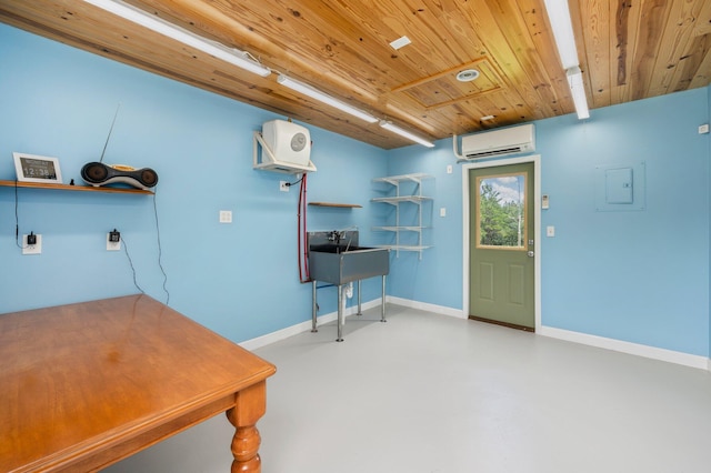 interior space with concrete flooring, an AC wall unit, and wood ceiling