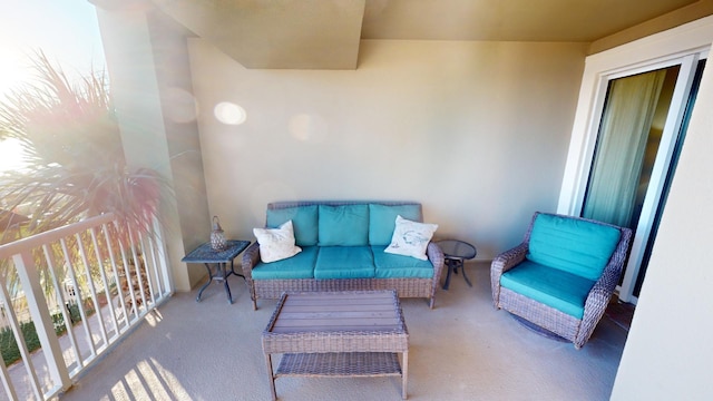 view of patio featuring a balcony