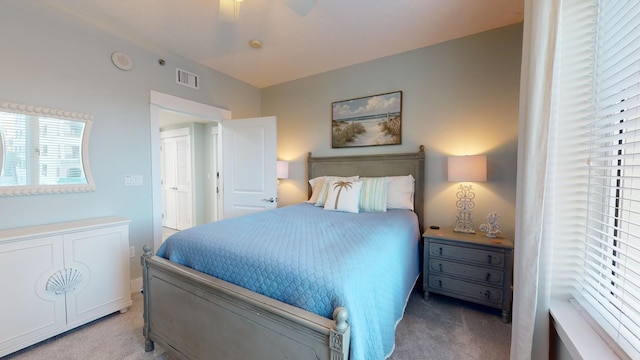 carpeted bedroom featuring ceiling fan