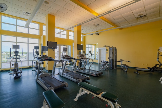 workout area with a drop ceiling