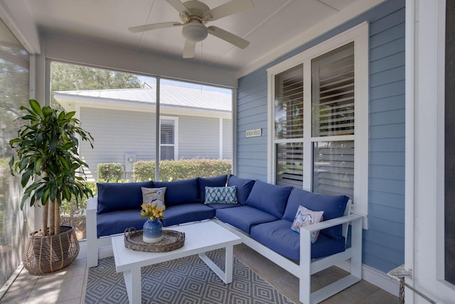 sunroom / solarium featuring ceiling fan and a healthy amount of sunlight