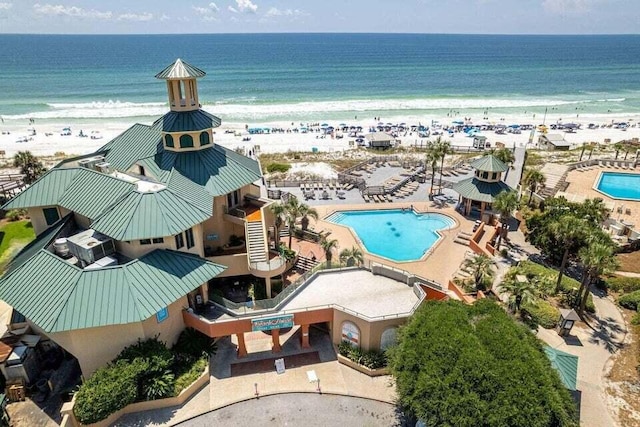 aerial view with a view of the beach and a water view