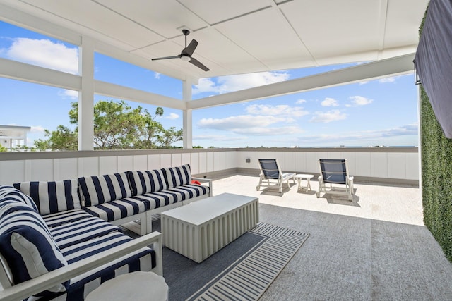 view of patio / terrace featuring ceiling fan and an outdoor living space