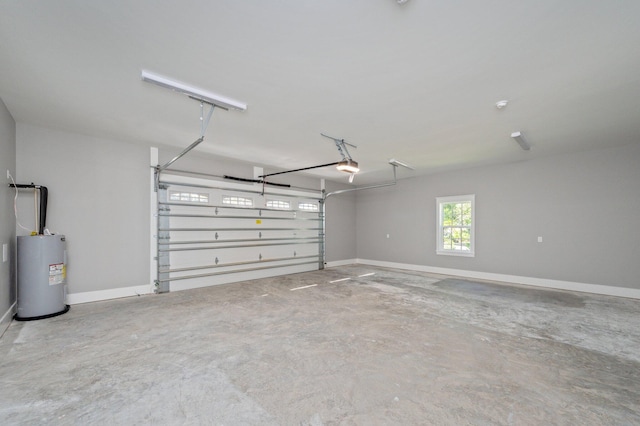 garage featuring electric water heater and a garage door opener