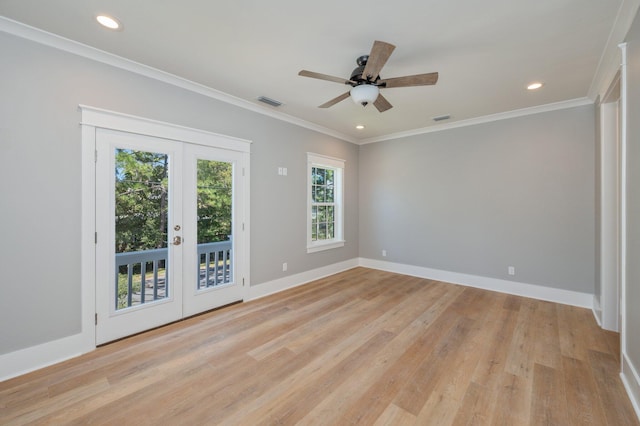 unfurnished room featuring french doors, light hardwood / wood-style floors, and ornamental molding