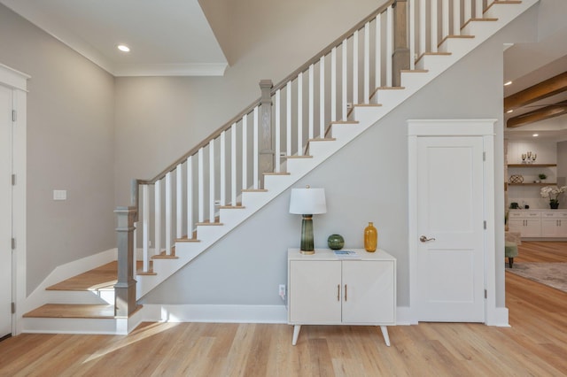 stairway with wood-type flooring