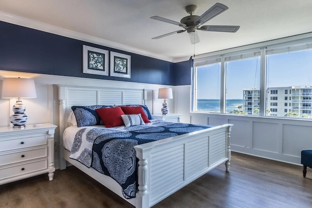 bedroom with ceiling fan and dark hardwood / wood-style floors