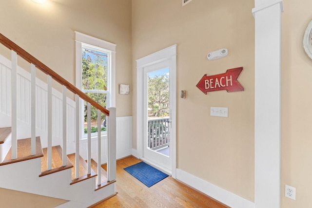 entryway with light hardwood / wood-style flooring