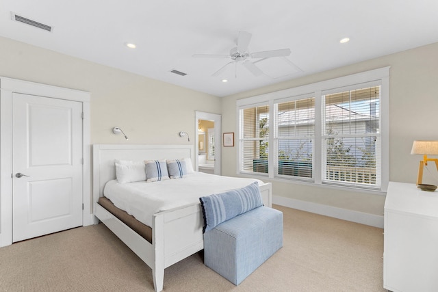 carpeted bedroom featuring ceiling fan