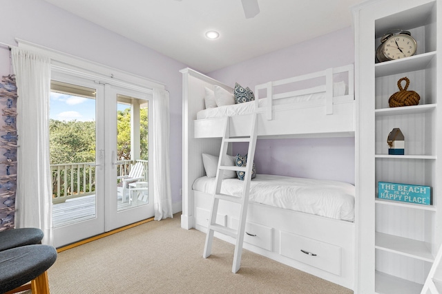 bedroom featuring carpet, french doors, access to outside, and ceiling fan