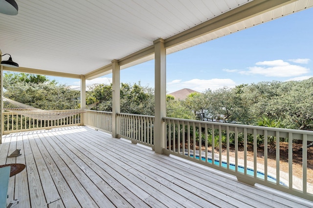 deck with a swimming pool