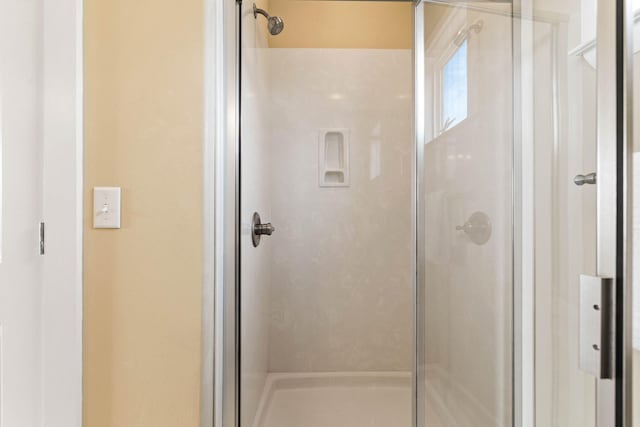 bathroom featuring walk in shower