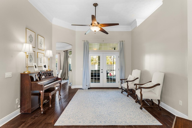 sitting room featuring ornamental molding, french doors, and dark hardwood / wood-style flooring