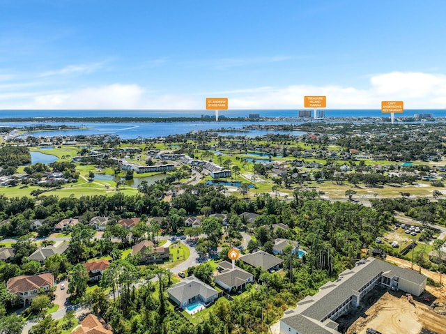 drone / aerial view with a water view