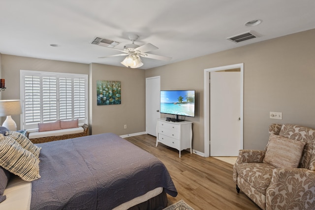 bedroom featuring light hardwood / wood-style floors and ceiling fan