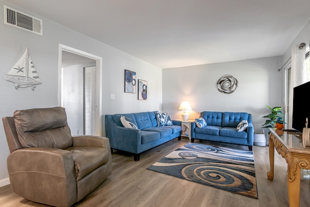 living room featuring hardwood / wood-style flooring