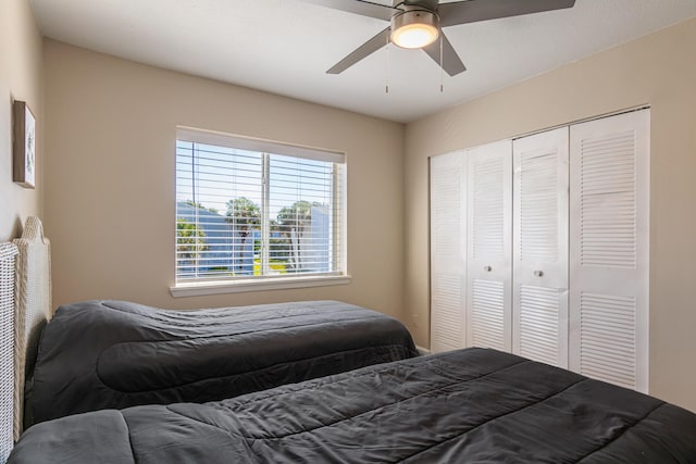 bedroom featuring a closet and ceiling fan