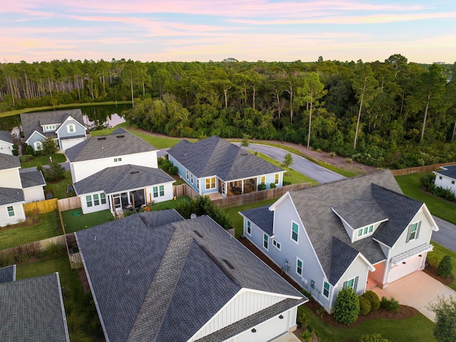 aerial view featuring a view of trees