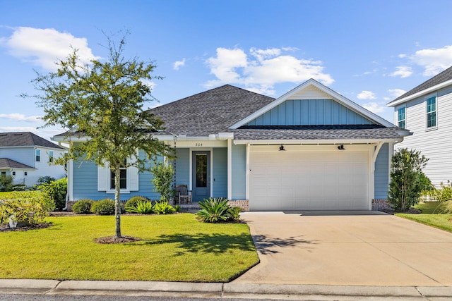 ranch-style home with board and batten siding, driveway, roof with shingles, a front yard, and a garage