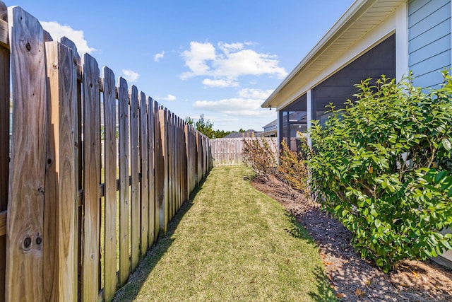 view of yard with a fenced backyard