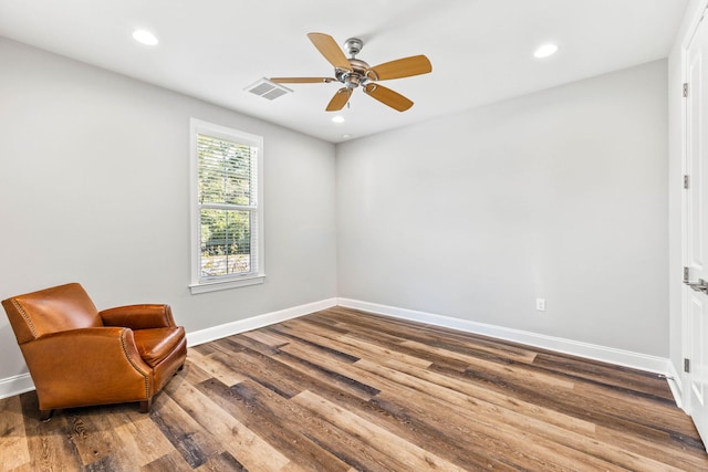 sitting room featuring recessed lighting, wood finished floors, visible vents, a ceiling fan, and baseboards