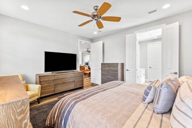 bedroom featuring wood-type flooring and ceiling fan