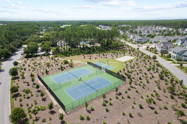birds eye view of property with a residential view