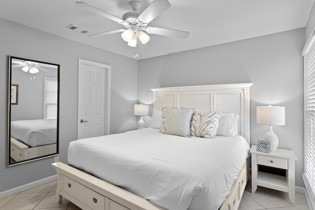 81 S Orange St Unit 209, Inlet Beach, FL 32461 - bedroom with light tile patterned floors, baseboards, ceiling fan, and multiple windows