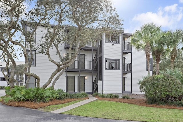 81 S Orange St Unit 209, Inlet Beach, FL 32461 - view of front of property featuring a front yard and stairs