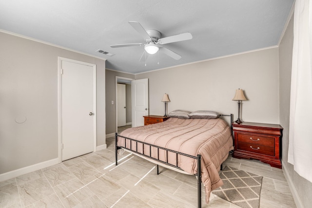 bedroom with ornamental molding and ceiling fan