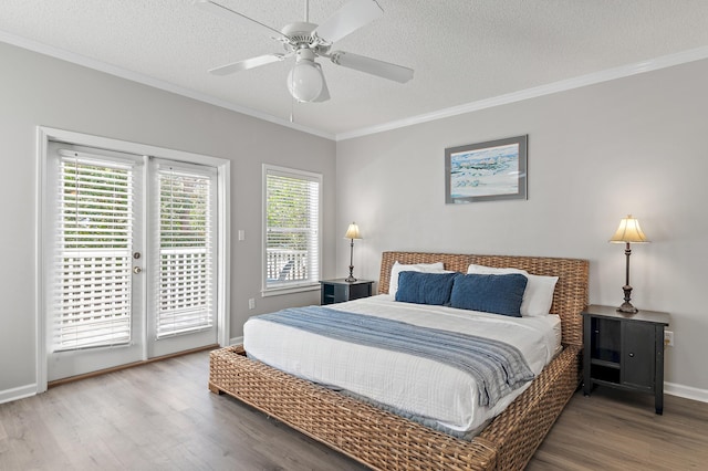 bedroom featuring access to outside, a textured ceiling, wood-type flooring, and ceiling fan