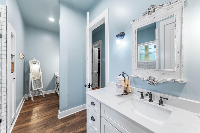 bathroom featuring vanity and wood-type flooring