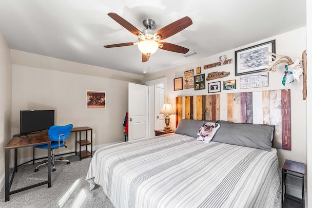 carpeted bedroom with ceiling fan