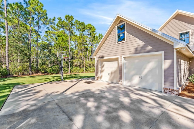 garage with a yard