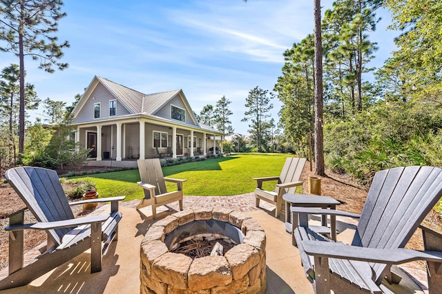 view of patio / terrace featuring a fire pit