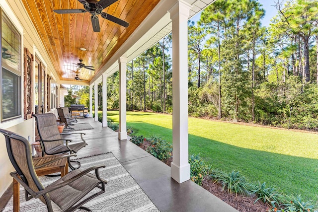 view of patio featuring ceiling fan