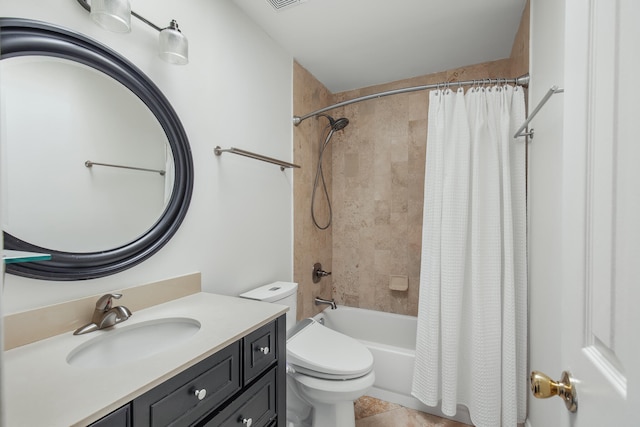 full bathroom with vanity, shower / bath combo, toilet, and tile patterned floors