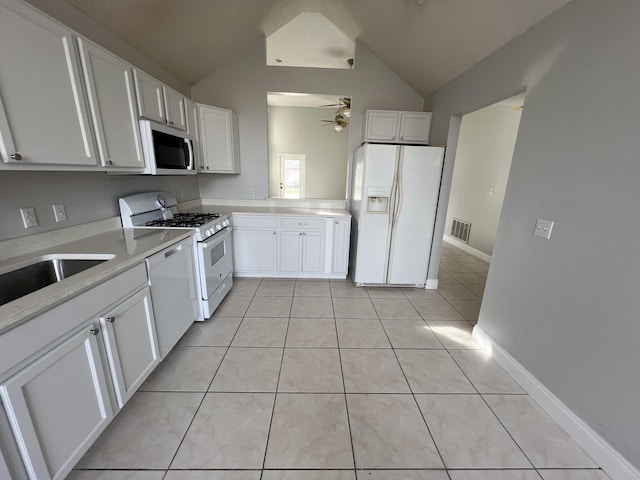 kitchen featuring white cabinetry, light tile patterned floors, white appliances, and ceiling fan